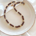 Mocha Gleam necklace with brown and clear crystals and gold-tone hematite accents