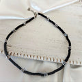 Unisex necklace with silver-tone hematite pebble beads and black disc beads, 45 cm with 5 cm extension